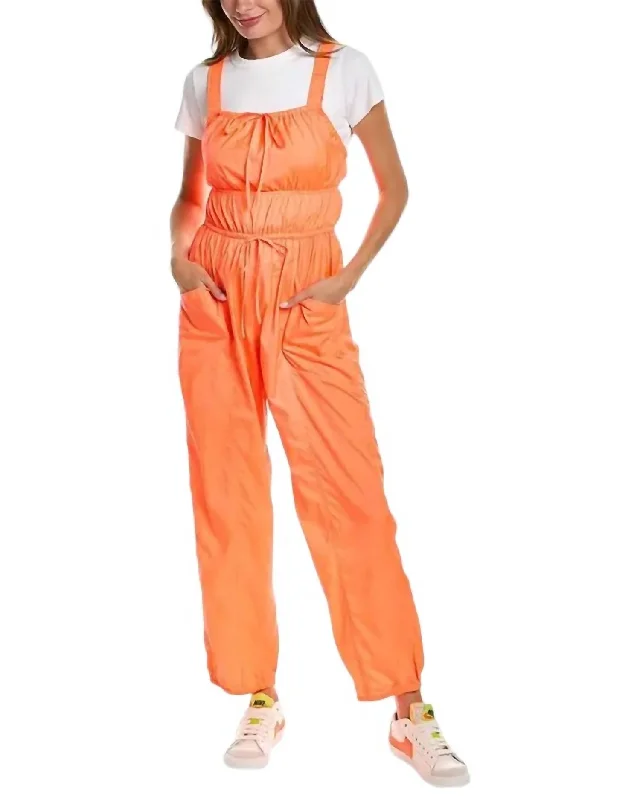 Tropic Sport Jumpsuit In Orange